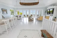 Serene waterfront house w pool, dock & beautiful sunsets - 5 min walk to beach.