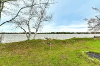 Lakefront Fall Home w/ Deck & Dock in Oscoda Twp! - 3-Star