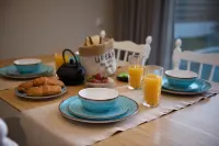 テッセラ ブティック ホテル & ヴィラズ - 朝食