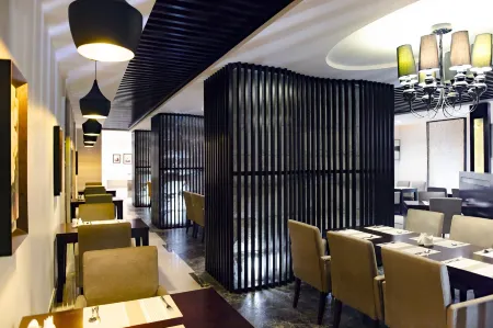 Boudl Al Tahlia Отели рядом с достопримечательностью «Bicycle Square (Midan Addarajah)»