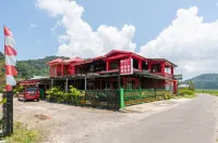 RedDoorz Syariah near Tirtasari Sonsang dan Banto  Hotel dekat Surau Nurussalam