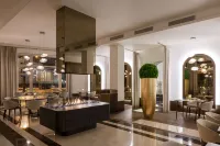 Grand Hotel Vilnius, Curio Collection by Hilton - breakfast