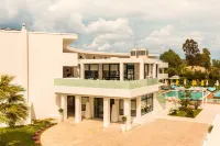 Nasos Hotel & Resort Hotels near Coop Supermarket