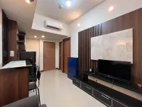 Warm and Cozy 2BR Vida View Makassar Apartment By Travelio