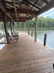 Waterfront house with boathouse, boat launch, outdoor kitchen, fire pit