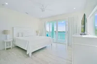 Oceanfront PARADISE w Heated pool, 55’ dock, ocean view & bathroom in every room