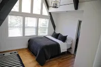 A frame cottage with private dock on lake