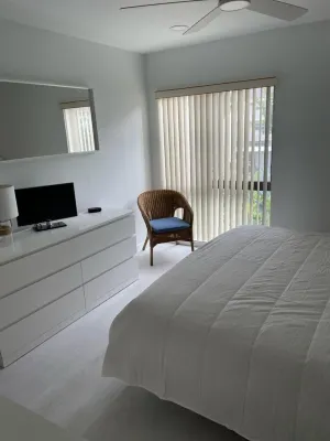 Renovated Bahia Vista 2nd floor 2 bedroom garden condo with partial Gulf views