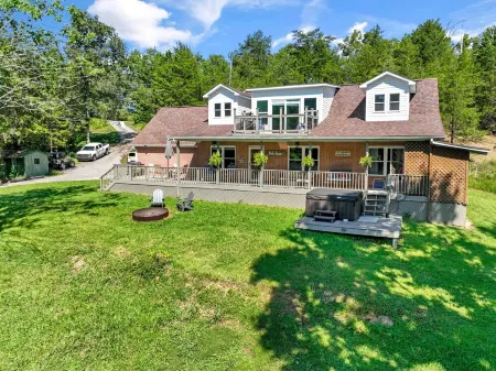 Relax with family and friends at this beautiful house on Douglas Lake.