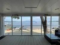 Cozy lakefront home on Ossipee Lake, w/beach, dock and amazing view.