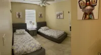 4 bedroom 2 bathroom villa near Disney world & champion gate area