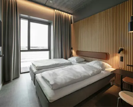 フォー ポインツ フレックス バイ シェラトン ホーセンス ヘーデンステット市のホテル