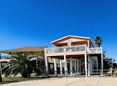 Home with beach view from front porch, only two minute walk to beach. Very Nice!