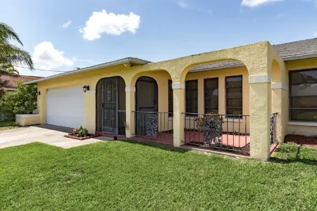 CAPE CORAL FLORIDA WATERFRONT WITH   HEATED POOL, PRIVATE DOCK