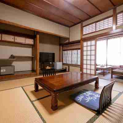 「ふぐ料理」と「源泉掛流し」を楽しむ宿 竹園旅館 Rooms