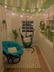 Updated 4-bedroom house with relaxing sunroom; minutes from downtown Raleigh.