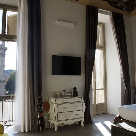 Piazza Castello Suite Отели рядом с достопримечательностью «Площадь Кастелло»