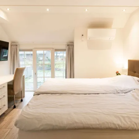 Family Villa + Sauna & Sunroom Hotels in Hellendoorn