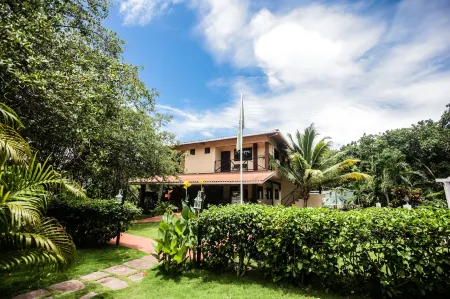 Manglar Lodge Отели в г. Сан Карлос