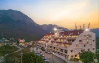 The Dynasty Resort Hotels near Khurpatal lake and mountain view