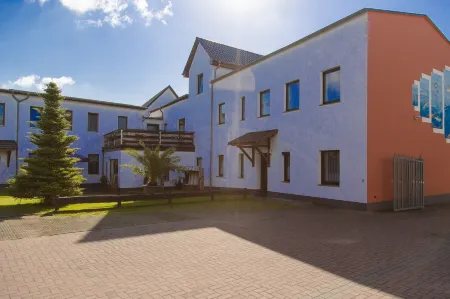 City-Hotel-Wolgast Отели в г. Зауцин