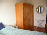 Ameland - apartment with balcony to the south side with a view of meadows and the village of Buren Hotels in Buren