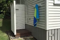 Delightful elevated sunny S/C Studio Hotels in Whangamata