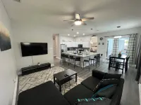 Modern and spacious getaway with a pool and grill