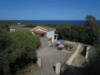 2 bedrooms, 1 living room with kitchen, shower/WC, terraces, Garden, Parking