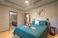 Peaceful 2BR condo with pool near ocean