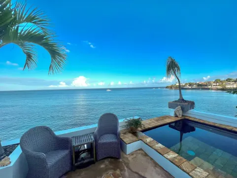 Stunning waterfront, art deco family compound cascading to the water’s edge