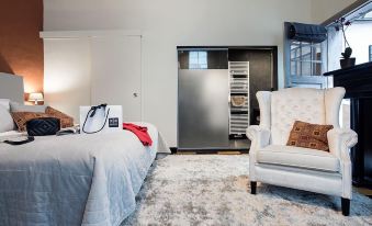 Ganda Rooms & Suites - Housity