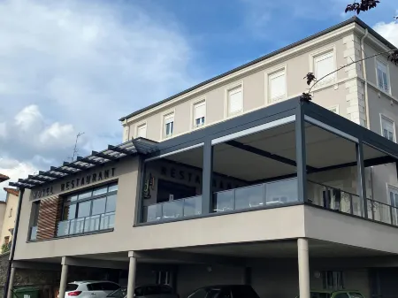 Logis Hôtel le Tisseur des Saveurs Отели в г. Фёр