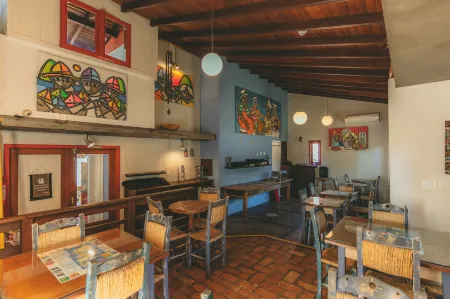 Pousada Vila Tamarindo Eco Lodge Отели в г. Флорианополис