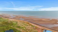 Seashell by the Seashore: Cozy 1BR Cottage Steps from Private Sandy Beach