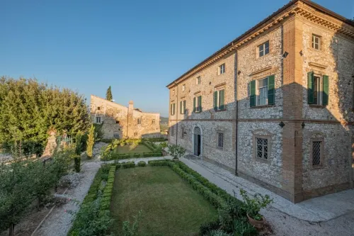 Historic villa with swimming pool surrounded by nature