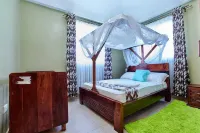 Coastal Retreat. Spacious 3-bedroom villa Just 8 minutes stroll from the Beach.