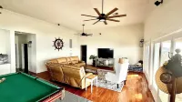 Majestic bayfront home. 450’ pier w/ boat access, crabbing, fishing, & swimming.