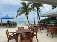 Palm Tree Cove - Stunning Partial Ocean Views; Beachfront Location!