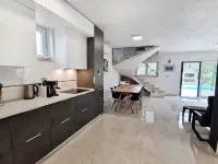 Two-storey house with pool Hotels in Murine