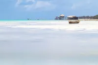Pingwe Beach Apartments - Meerblick