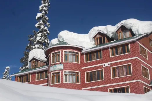 Fluorescence Hotel and Restaurant Hotels near Apharwat Peak