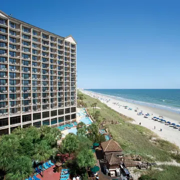 Beach Cove Resort Отели рядом с достопримечательностью «Поле для гольфа Barefoot Landing»