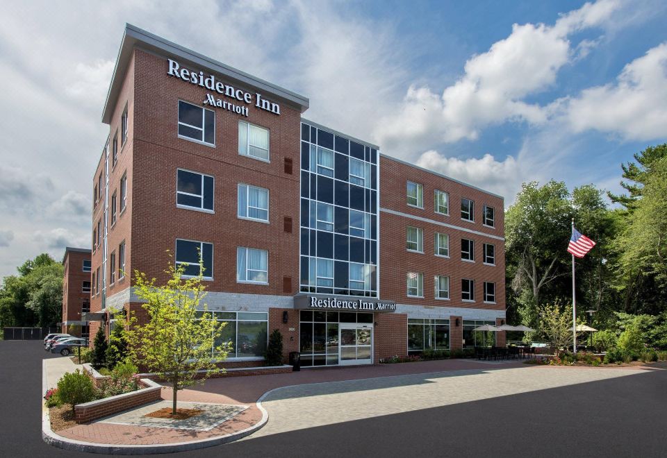 "a brick building with a sign that reads "" the residence inn by marriott "" prominently displayed on the front" at Residence Inn Boston Bridgewater