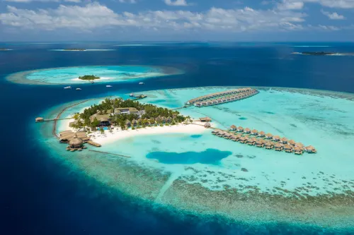Outrigger Maldives Maafushivaru Resort - piscina
