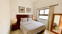 1 Bedroom Guest House - Walk to Everything - Roof Patio - Gym - Pickleball Court Hotels in Chapala