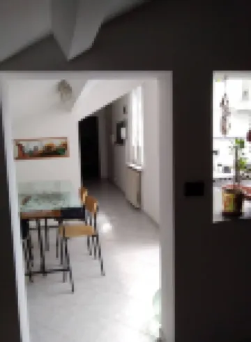 Spacious and Naturally Bright Bomboniera Rooftop Favors Apartment