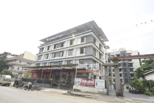 Vishnu Krupa Executive Rooms Hotels in Dhekale