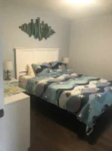 Renovated Home with heated pool near the beach! Fenced in yard +pet friendly