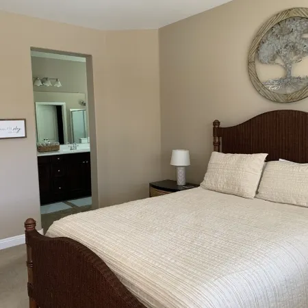 Great family friendly home very private back yard, heated pool & covered patio.